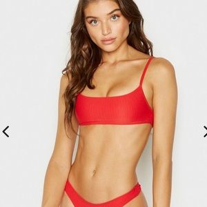 Frankie’s Bikinis Boots top in red. Size Small.